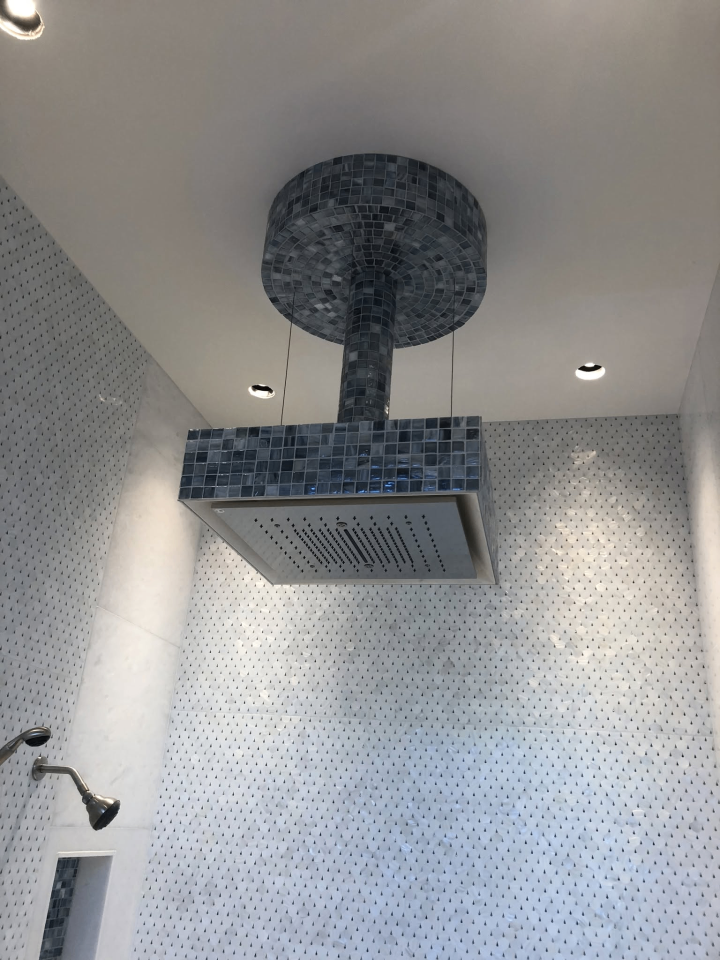 Custom mosaic tile shower ceiling detail